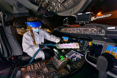 COVID-19 UV wand being used in the flight deck